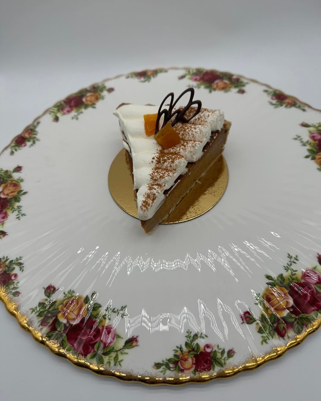 Signature dessert slice on The Ivy's rose china plate
